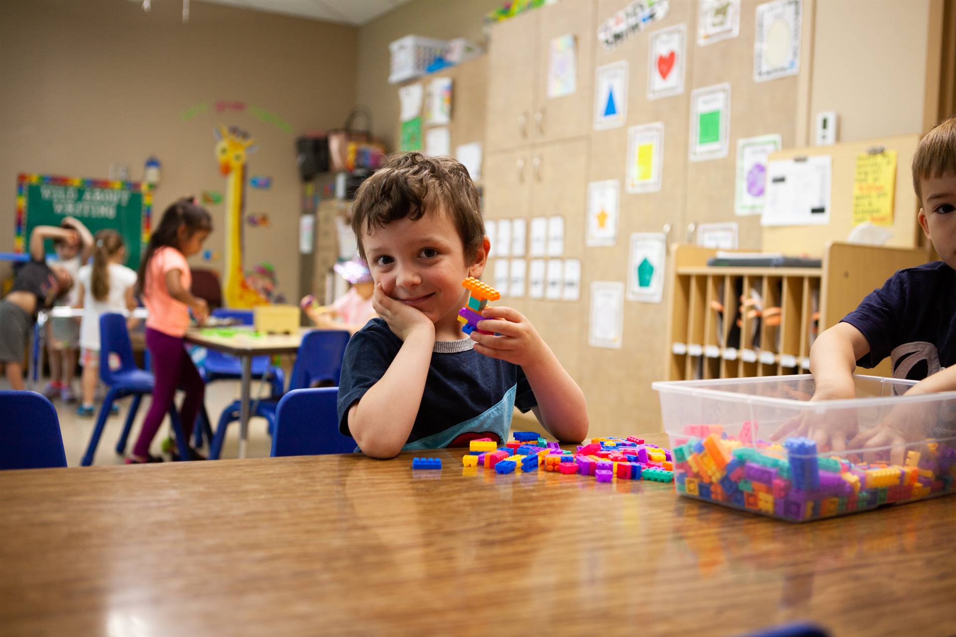 Preschool students playing with blocks