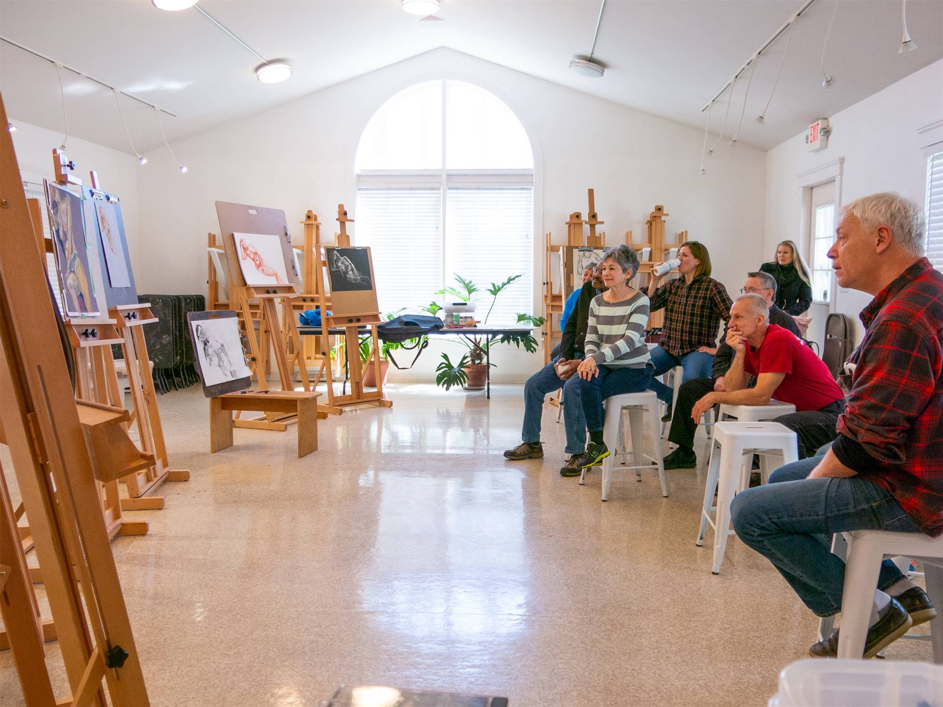 Group of young artists in the ceramic studio at the Orange Art Center 